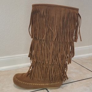 Knee high fringe moccasins